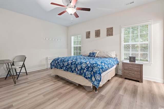 4331 Grande Harbour Blvd, Little River, SC 29566 - bedroom featuring light wood-style floors and ceiling fan