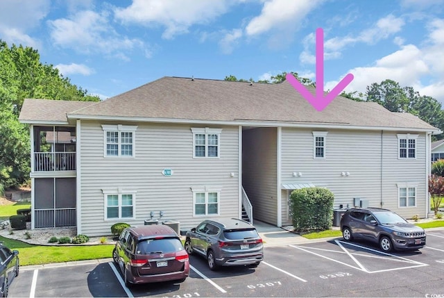 6309 Sweetwater Blvd ., Unit Murrells Inlet, SC 29576 - view of building exterior featuring uncovered parking