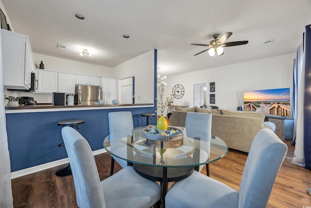 6309 Sweetwater Blvd ., Unit Murrells Inlet, SC 29576 - dining area with ceiling fan and wood finished floors