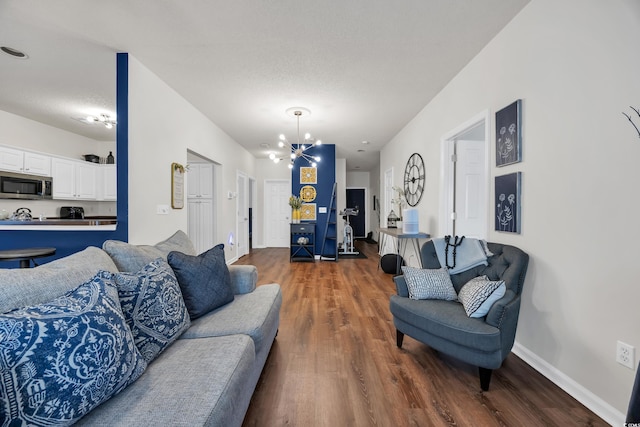6309 Sweetwater Blvd ., Unit Murrells Inlet, SC 29576 - living room with wood finished floors, a chandelier, and baseboards