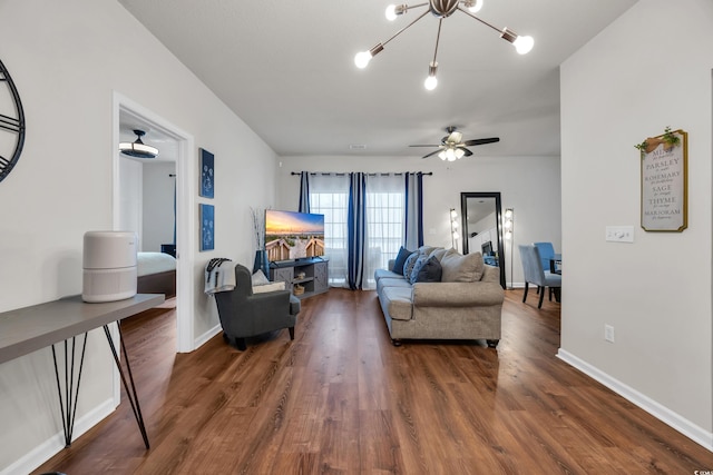 6309 Sweetwater Blvd ., Unit Murrells Inlet, SC 29576 - living room featuring a ceiling fan, wood finished floors, baseboards, and a chandelier