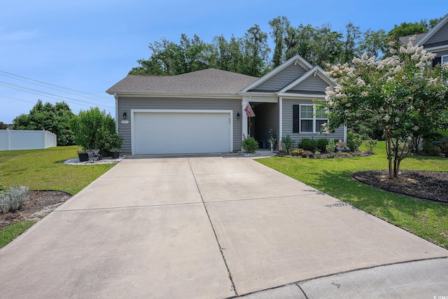 409 Spring View Ct, Little River, SC 29566 - ranch-style home with an attached garage and driveway