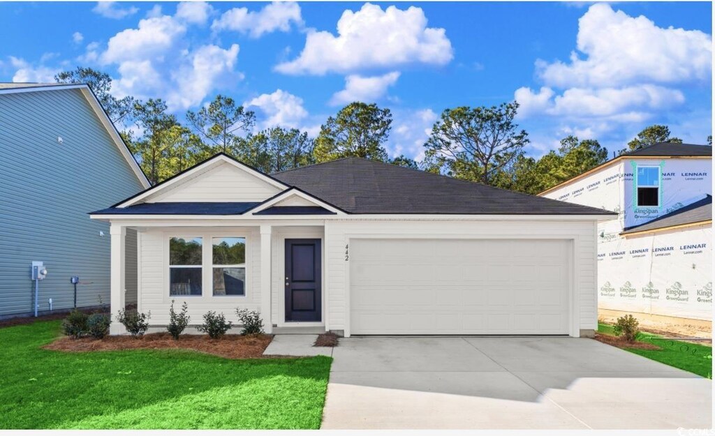 1217 Willow Oaks Way, Conway, SC 29526 - view of front facade featuring an attached garage, driveway, and a front yard