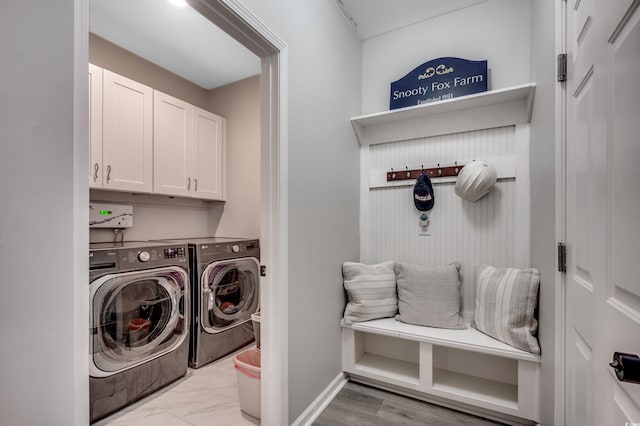 5013 Sassari St, Myrtle Beach, SC 29579 - laundry room with separate washer and dryer, cabinet space, baseboards, and light marble finish floors