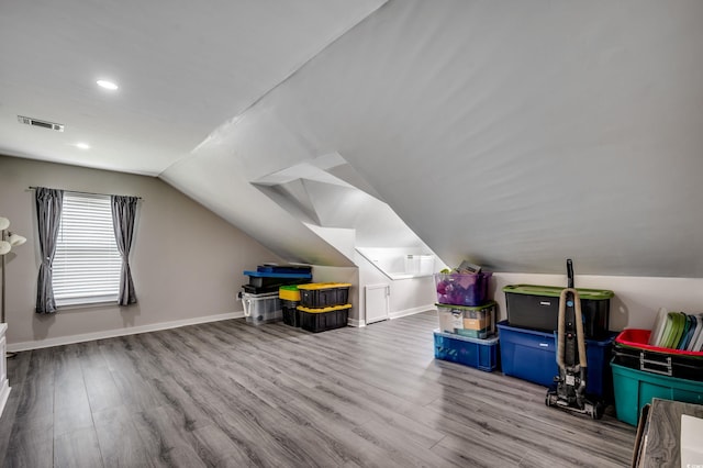 5013 Sassari St, Myrtle Beach, SC 29579 - bonus room featuring vaulted ceiling, wood finished floors, baseboards, and recessed lighting