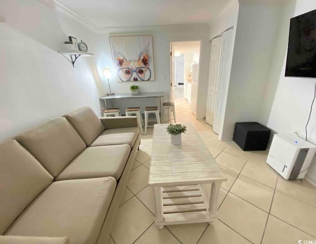 2001 S Ocean Blvd Unit 1109, Myrtle Beach, SC 29575 - living room featuring light tile patterned floors and crown molding