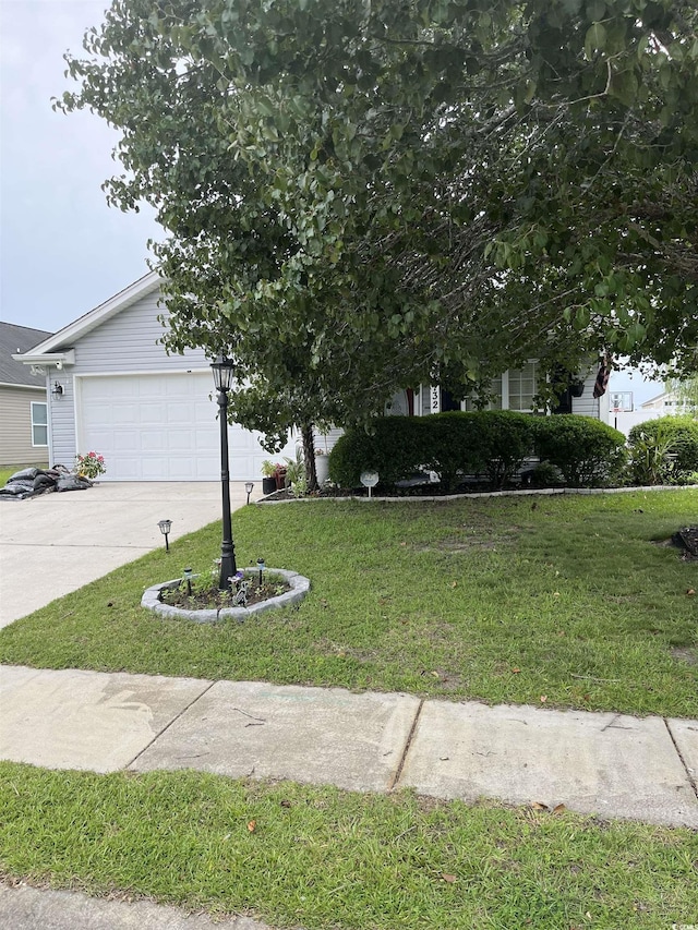 132 Carolina Pointe Way, Little River, SC 29566 - view of front facade featuring a front lawn, concrete driveway, and an attached garage