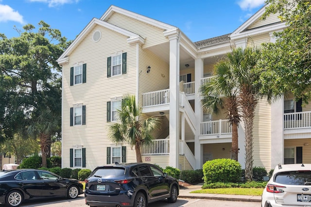 601 Hillside Dr N Unit 1931, North Myrtle Beach, SC 29582 - view of building exterior featuring uncovered parking