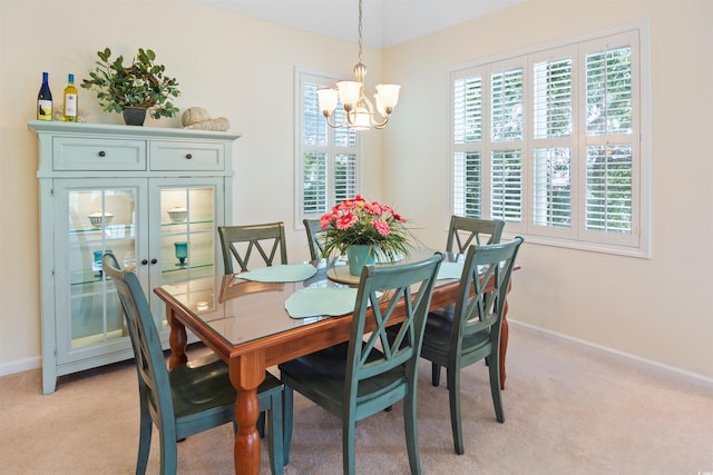 601 Hillside Dr N Unit 1931, North Myrtle Beach, SC 29582 - dining space featuring a chandelier, baseboards, and light carpet