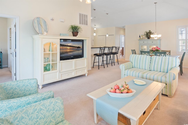 601 Hillside Dr N Unit 1931, North Myrtle Beach, SC 29582 - carpeted living room with ceiling fan, lofted ceiling, and a chandelier