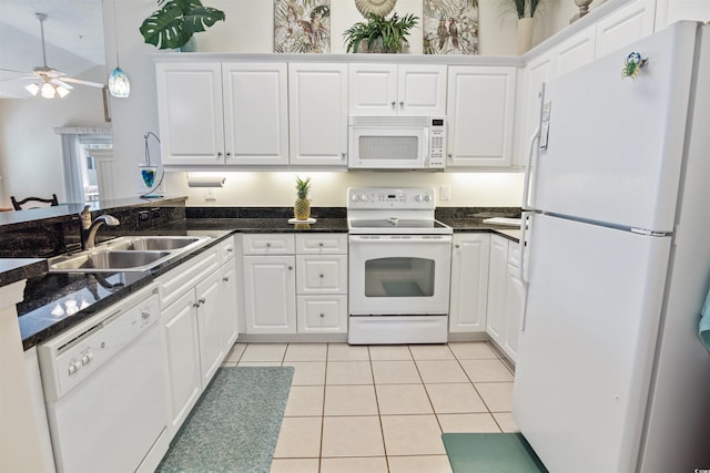 601 Hillside Dr N Unit 1931, North Myrtle Beach, SC 29582 - kitchen featuring white appliances, a sink, white cabinetry, ceiling fan, and light tile patterned flooring