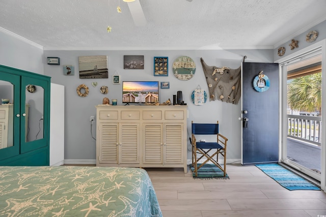 5909 N Ocean Blvd Unit 18, North Myrtle Beach, SC 29582 - bedroom with crown molding, access to outside, a textured ceiling, baseboards, and light wood-type flooring