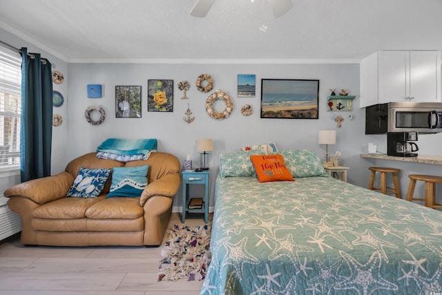 5909 N Ocean Blvd Unit 18, North Myrtle Beach, SC 29582 - bedroom featuring crown molding and ceiling fan