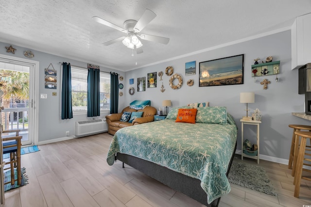 5909 N Ocean Blvd Unit 18, North Myrtle Beach, SC 29582 - bedroom featuring access to exterior, light wood-type flooring, a textured ceiling, crown molding, and baseboards