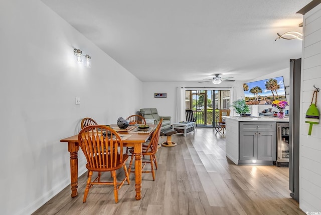 1870 Auburn Dr Unit 22A, Surfside Beach, SC 29575 - dining space with beverage cooler, light wood-style floors, and a ceiling fan