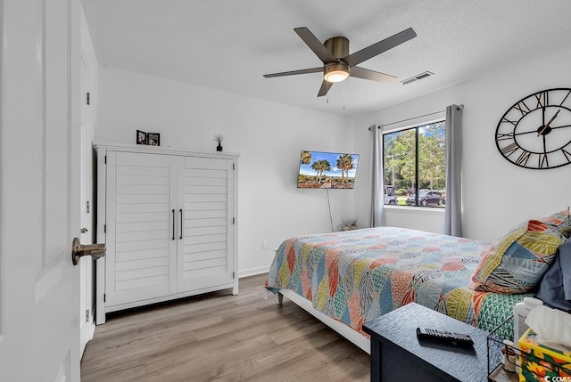 1870 Auburn Dr Unit 22A, Surfside Beach, SC 29575 - bedroom featuring wood finished floors and ceiling fan