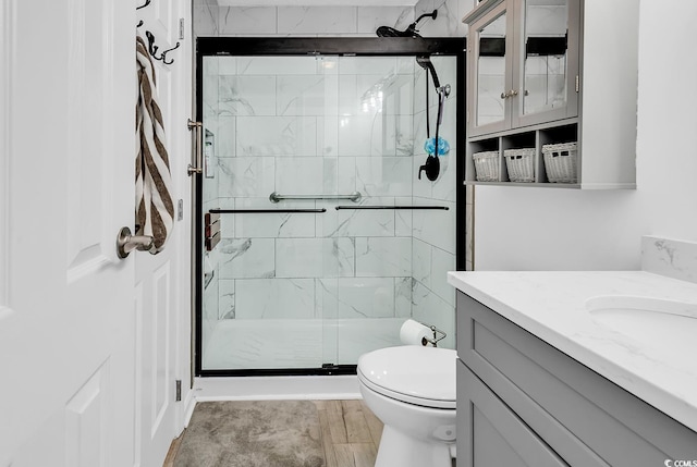 1870 Auburn Dr Unit 22A, Surfside Beach, SC 29575 - bathroom with toilet, vanity, and a shower stall