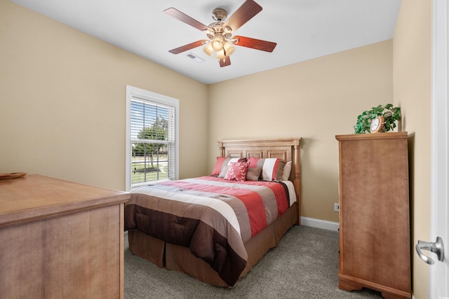 1149 6th Ave S, North Myrtle Beach, SC 29582 - bedroom with light carpet, a ceiling fan, and baseboards