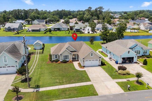 1149 6th Ave S, North Myrtle Beach, SC 29582 - aerial view of residential area featuring a nearby body of water