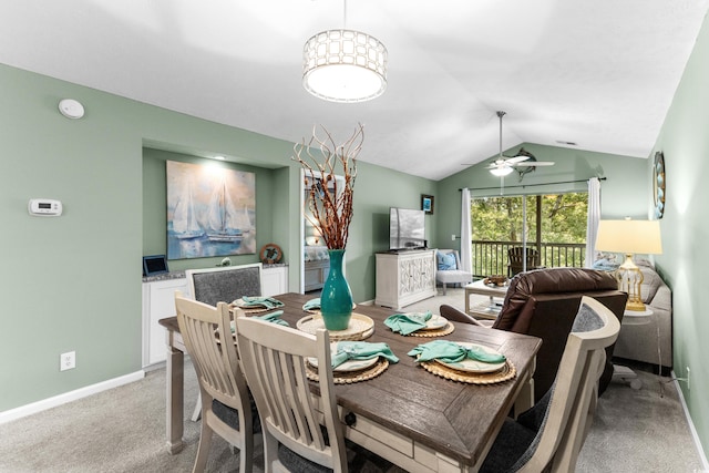 117 Pinehurst Ln Unit 5-J, Pawleys Island, SC 29585 - dining room featuring a ceiling fan, vaulted ceiling, light carpet, and baseboards