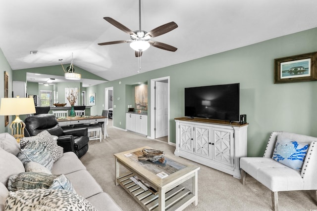 117 Pinehurst Ln Unit 5-J, Pawleys Island, SC 29585 - living room featuring lofted ceiling, light carpet, a ceiling fan, and baseboards