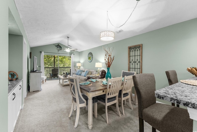 117 Pinehurst Ln Unit 5-J, Pawleys Island, SC 29585 - dining space with ceiling fan, vaulted ceiling, and light colored carpet
