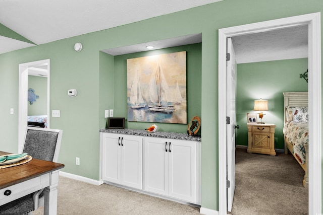 117 Pinehurst Ln Unit 5-J, Pawleys Island, SC 29585 - bar featuring light carpet and baseboards