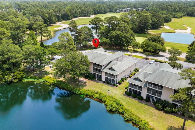 117 Pinehurst Ln Unit 5-J, Pawleys Island, SC 29585 - drone / aerial view of a large body of water, a golf course, and a forest