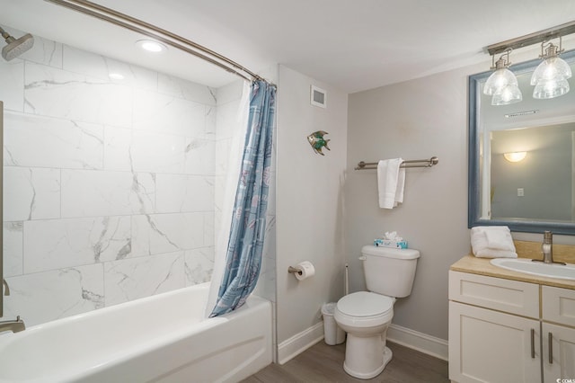 8560 Queensway Blvd Unit 106, Myrtle Beach, SC 29572 - bathroom with vanity, shower / tub combo with curtain, toilet, wood finished floors, and baseboards