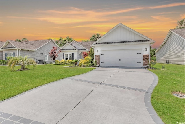 832 Windsor Rose Dr, Conway, SC 29526 - view of front of house featuring brick siding, a front yard, concrete driveway, board and batten siding, and central air condition unit
