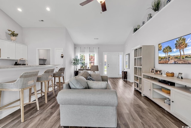 832 Windsor Rose Dr, Conway, SC 29526 - living room with wood finished floors, high vaulted ceiling, ceiling fan, recessed lighting, and baseboards