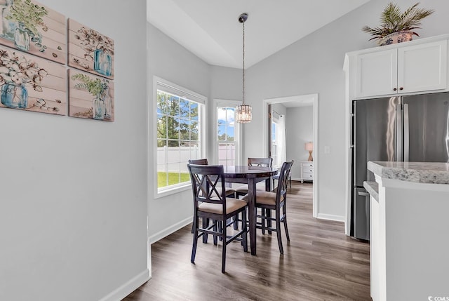832 Windsor Rose Dr, Conway, SC 29526 - dining room featuring a chandelier, healthy amount of natural light, wood finished floors, baseboards, and high vaulted ceiling