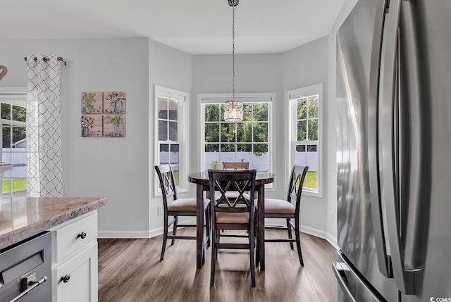 832 Windsor Rose Dr, Conway, SC 29526 - dining room with light wood-style floors and baseboards