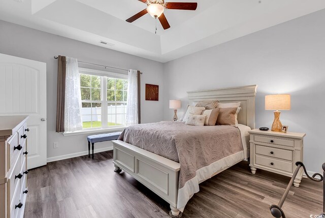 832 Windsor Rose Dr, Conway, SC 29526 - bedroom featuring a raised ceiling, dark wood-style floors, baseboards, and a ceiling fan
