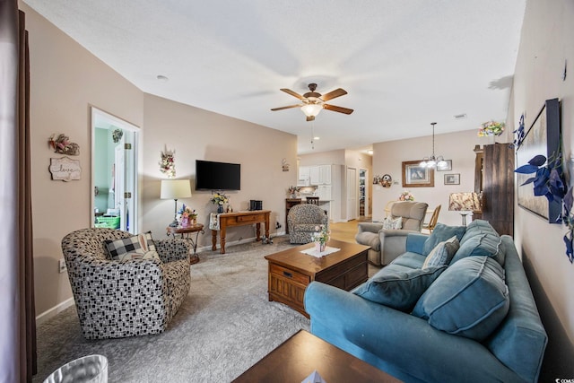 155 Lazy Willow Ln Unit 103, Myrtle Beach, SC 29572 - living area with a chandelier, a ceiling fan, carpet floors, and baseboards
