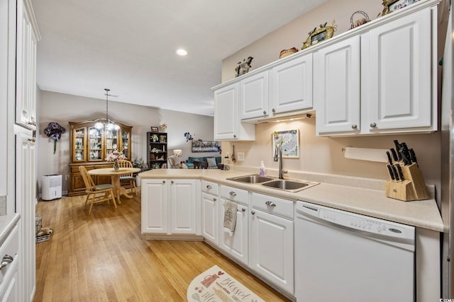 155 Lazy Willow Ln Unit 103, Myrtle Beach, SC 29572 - kitchen featuring dishwasher, a sink, light countertops, white cabinetry, and recessed lighting