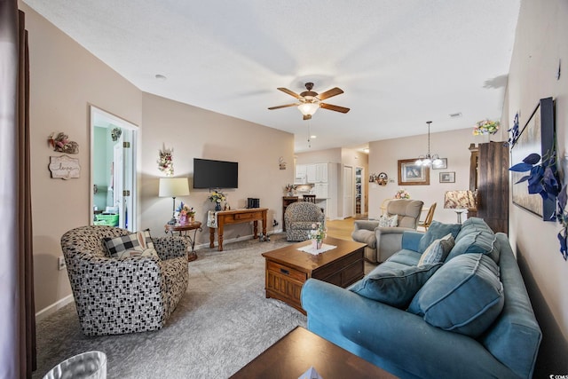 155 Lazy Willow Ln Unit 103, Myrtle Beach, SC 29572 - carpeted living room with a chandelier, a ceiling fan, and baseboards