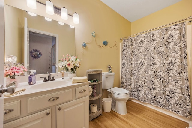155 Lazy Willow Ln Unit 103, Myrtle Beach, SC 29572 - full bathroom featuring wood finished floors, toilet, vanity, and a shower with curtain