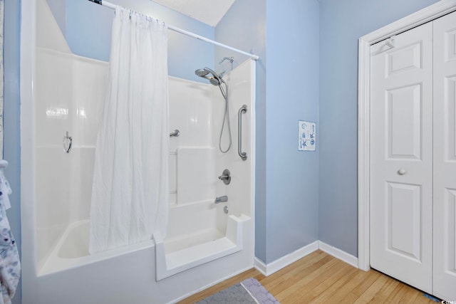 155 Lazy Willow Ln Unit 103, Myrtle Beach, SC 29572 - full bath featuring wood finished floors, shower / bath combination with curtain, and baseboards