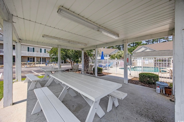 155 Lazy Willow Ln Unit 103, Myrtle Beach, SC 29572 - view of patio / terrace with a community pool and outdoor dining area