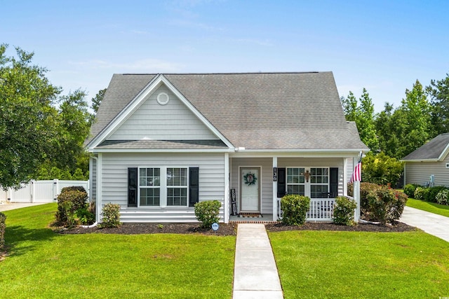 136 Southbury Dr, Myrtle Beach, SC 29588 - view of front facade featuring a porch and a shingled roof