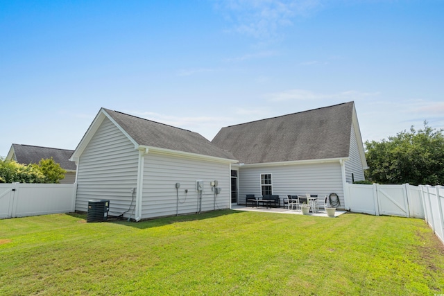 136 Southbury Dr, Myrtle Beach, SC 29588 - rear view of house with a gate, a fenced backyard, a patio area, and roof with shingles