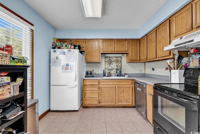 405 Flagstone Dr, Myrtle Beach, SC 29588 - kitchen featuring freestanding refrigerator, black electric range oven, stainless steel dishwasher, under cabinet range hood, and light countertops