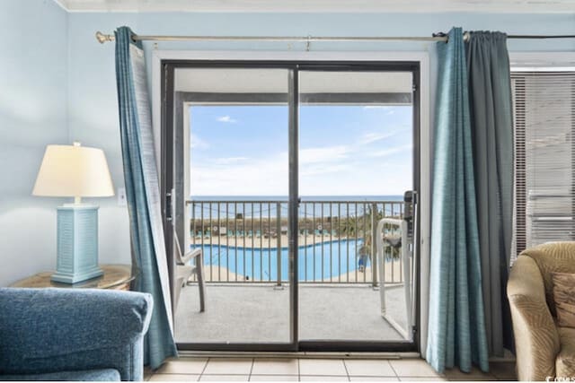5905 S Kings Hwy Unit 206A, Myrtle Beach, SC 29575 - entryway featuring light tile patterned floors and a water view