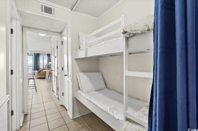 5905 S Kings Hwy Unit 206A, Myrtle Beach, SC 29575 - bedroom with tile patterned floors