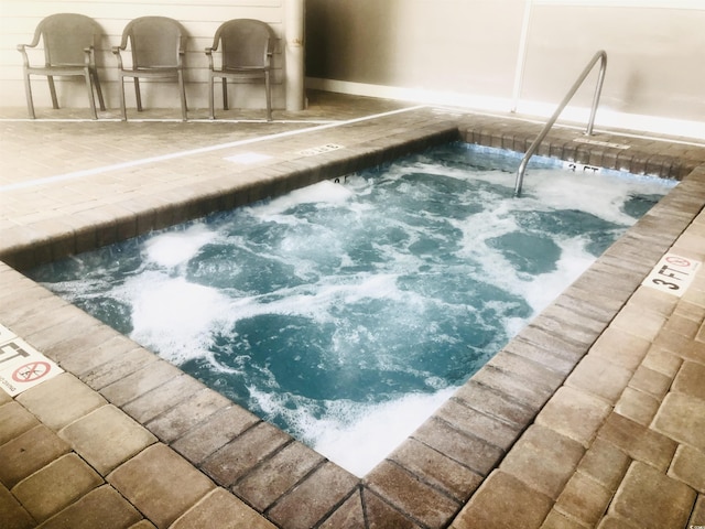 5905 S Kings Hwy Unit 206A, Myrtle Beach, SC 29575 - view of swimming pool with a hot tub