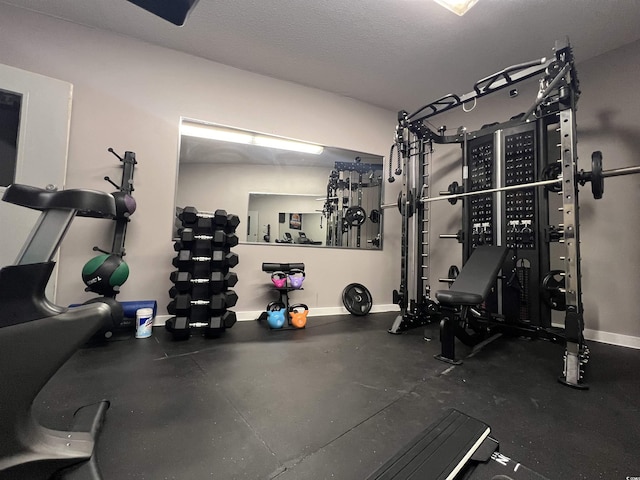5905 S Kings Hwy Unit 206A, Myrtle Beach, SC 29575 - workout area with baseboards and a textured ceiling