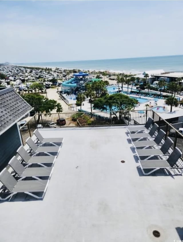 5905 S Kings Hwy Unit 206A, Myrtle Beach, SC 29575 - drone / aerial view of a nearby body of water and a pool area