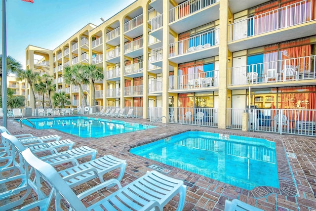 1207 S Ocean Blvd Unit 51012, Myrtle Beach, SC 29577 - community pool featuring a patio area