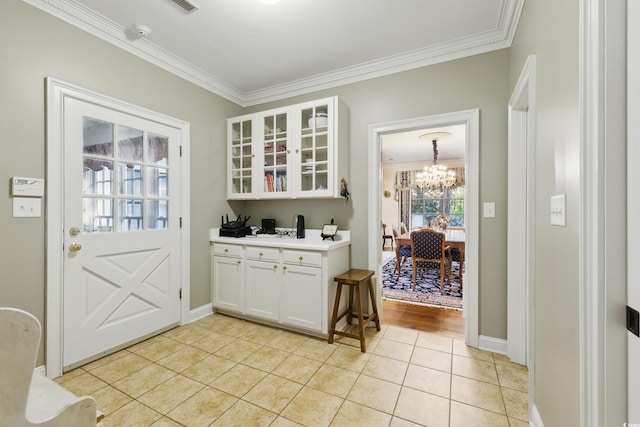 1259 Oatland Lake Rd, Pawleys Island, SC 29585 - bar area with crown molding, a chandelier, and light tile patterned floors